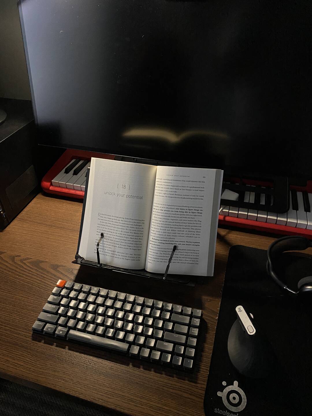 A book holder with a book ready on my desk